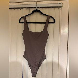 mauve colored bodysuit
